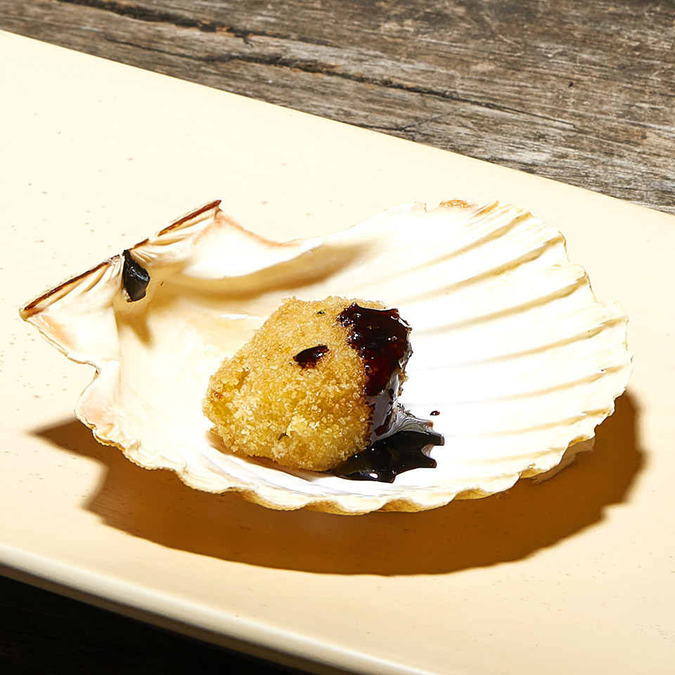Capesante gratinate e gocce di Aceto Balsamico Tradizionale di Modena D.O.P.